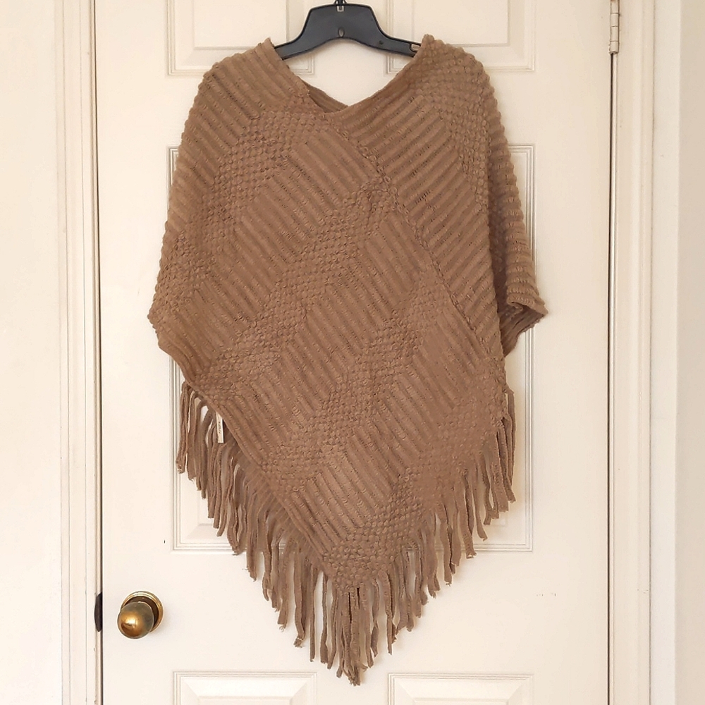 NWT. Sweater Shawl Poncho Pullover with multi patterns.